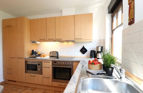 Ostseebad Prerow Apartment | Tranquil Retreat with Scenic Views and Family Amenities