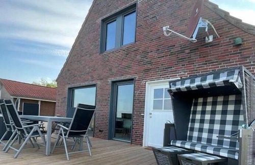 Neßmersiel House | Oceanfront Getaway at Ferienwohnung Friesenblick