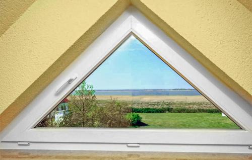 Fuhlendorf Apartment | Scenic Apartment in Fuhlendorf with Lake View, 4 Stars
