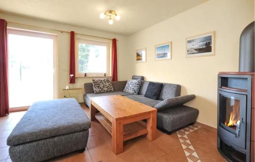Fuhlendorf Apartment | Scenic Apartment in Fuhlendorf with Lake View, 4 Stars
