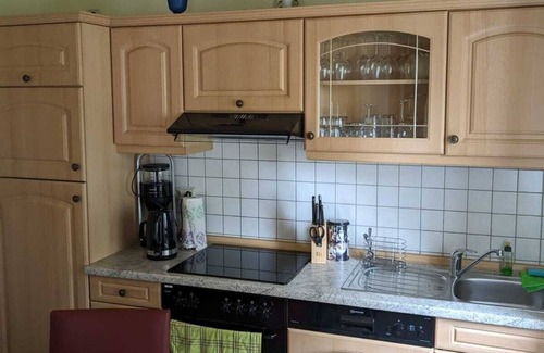 Neuenkirchen Apartment | Tranquil Ferienwohnung Gartenblick: Pet-Friendly Retreat