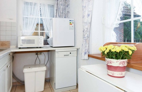 Dunum Apartment | Ocean View Getaway at Ferienwohnung Löwenzahn