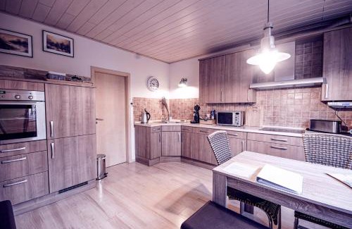 Heinsberg Apartment | Oceanfront Retreat at Ferienwohnung Leon - 4-Star Paradise