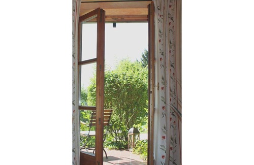 Bad Birnbach Apartment | Cozy Retreat with Fireplace and South Terrace View