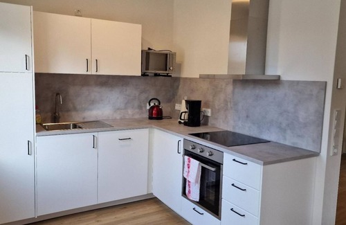Beurig Apartment | Ocean View Retreat: Family-Friendly Ferienwohnung Pütz