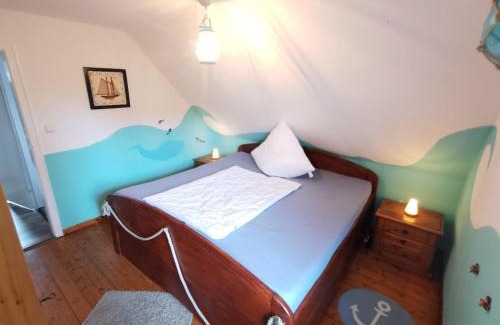 Nordholz Apartment | Cozy Pipistrello Apartment with Mini Zoo & Family-Friendly Fun