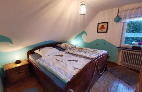 Nordholz Apartment | Cozy Pipistrello Apartment with Mini Zoo & Family-Friendly Fun