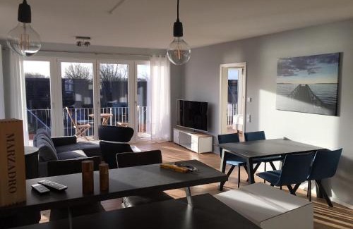 Eckernfoerde Apartment | Ferienwohnung "Seglersteg, Bungalow 11" Hafenspitze