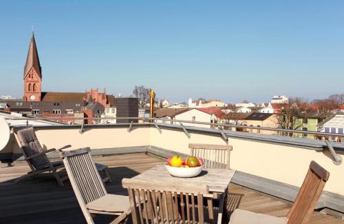 Warnemuende Apartment | Family-Friendly Ferienwohnung Warnemünde in City Villa L