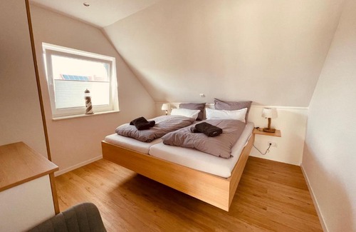 Norddeich Apartment | Unforgettable Family Getaway at Ferienwohnungen MEERAUSZEIT