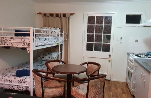 Horse Creek Apartment | Cozy Ferns Miners Rest Motel: Pet-Friendly & Breakfast Included
