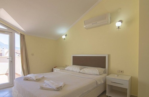 Mentese Apartment | Beachfront Escape at Sunset Beach Club, Fethiye Çalış