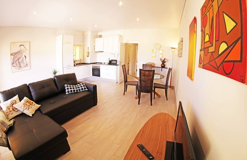 Alvor Condo | Steps from the Beach: Oceanfront Retreat near Alvor Village