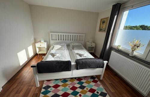 Jurgenohl Apartment | FeWo Domo46 mit Balkon, Waschmaschine & Smart TV