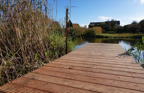 Bad Freienwalde Apartment | Scenic Fewo EG am Fluss with Terrace - A Green Retreat