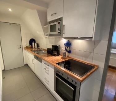Sehestedt Apartment | Discover Family-Friendly Comfort at FeWo Eichenwipfel