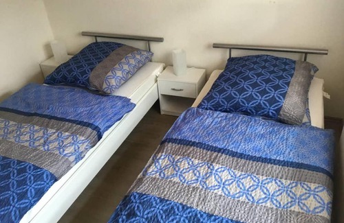 Stollhamm Apartment | Family-Friendly Retreat at Fewo.Hesume with Top Reviews