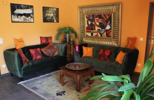 Brandau Apartment | Experience FeWo: Garden Paradise with Ocean Views