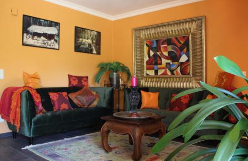 Brandau Apartment | Experience FeWo: Garden Paradise with Ocean Views