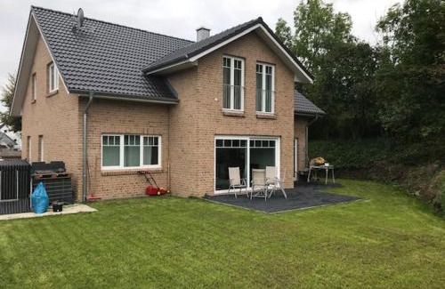 Brenkenhagen Apartment | Family-Friendly FewoSchmiede2EG with Pet Care Services