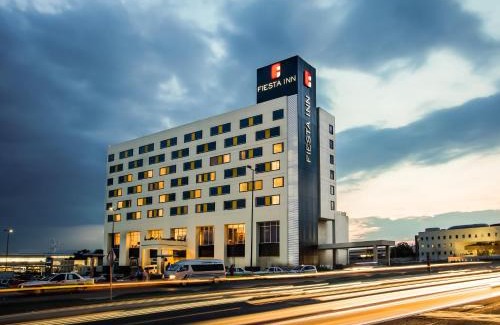 Pachuca Hotel | Discover Fiesta Inn Pachuca Gran Patio: Family-Friendly Retreat