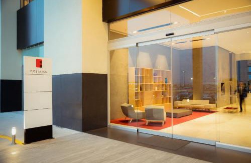 Pachuca Hotel | Discover Fiesta Inn Pachuca Gran Patio: Family-Friendly Retreat