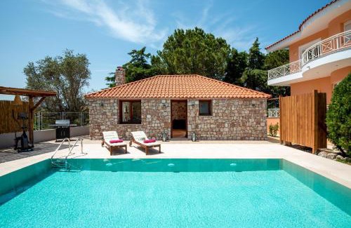 Pastida Villa | Experience Filerolia Stone House: Oceanfront with Pool