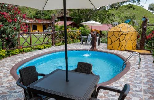 San Luis Cabin | Explore Finca Hotel Rios Claros: Family & Pet-Friendly Retreat