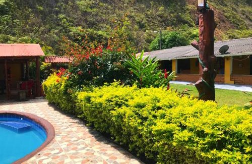 San Luis Cabin | Explore Finca Hotel Rios Claros: Family & Pet-Friendly Retreat
