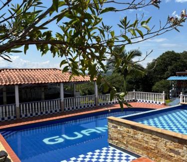 Socorro Cabin | Pet-Friendly Finca Vacacional Guanani with Ocean View Pool