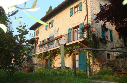 Malcesine Villa | Elegant Farmhouse Retreat with Oceanfront View & Garden
