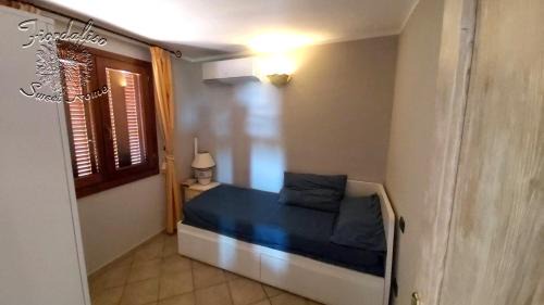 Pittulongu Apartment | Fiordaliso Sweet Home: Oceanfront Oasis with Pool Access