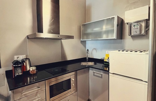 La Font de la Guatlla Apartment | Fira Centric Apartments: Guest Rated & Family-Friendly Stay