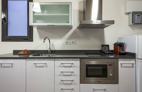 La Font de la Guatlla Apartment | Fira Centric Apartments: Guest Rated & Family-Friendly Stay