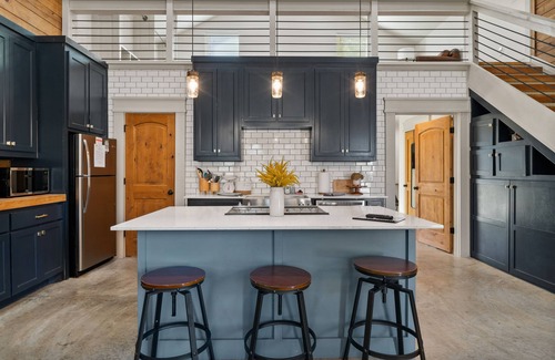 Denison House | Relax by the Fire Pit & Enjoy Outdoor Games Near Main Street