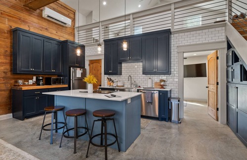 Denison House | Relax by the Fire Pit & Enjoy Outdoor Games Near Main Street