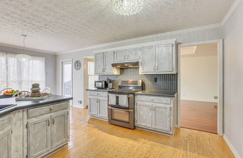 Dacula House | Fire Pit & Wooded Views: Family Home in Dacula!