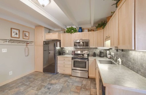 Wildernest Condo | Cozy Retreat: Fireplace, Pool & Adventure Await You