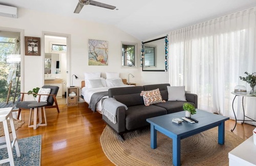 Bellbrae Apartment | Fireside Bliss Poolside Escape with Cosy Comforts