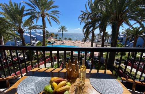 Playa del Aguila Apartment | Beachfront Maritime Deluxe Apartment with Balcony & Pool