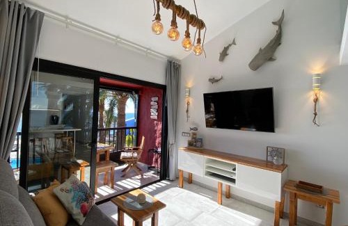 Playa del Aguila Apartment | Beachfront Maritime Deluxe Apartment with Balcony & Pool