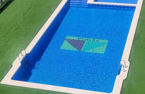 Mar de Cristal Apartment | Cozy Apartment with Pool & Garden Steps from the Beach