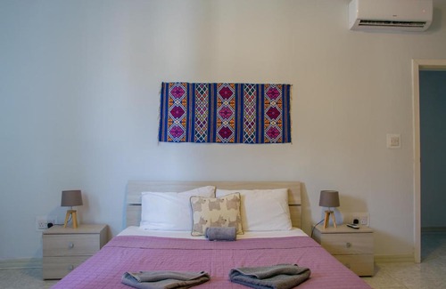 Marsaskala Apartment | Prime Corner Apartment Steps from the Promenade - 10/10 Rated