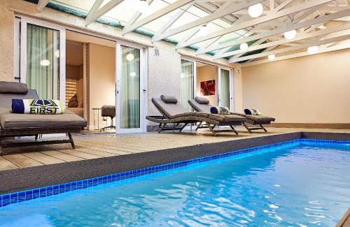 Sea Point Hotel | Relax at First Group Riviera Suites with Oceanfront Amenities