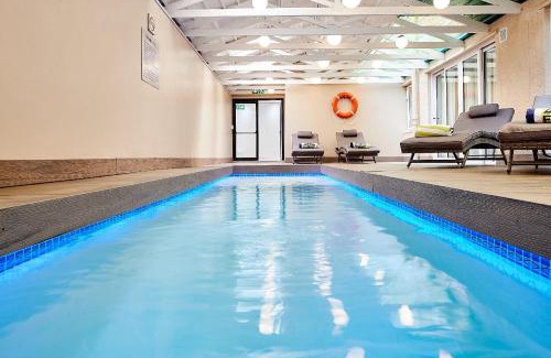 Sea Point Hotel | Relax at First Group Riviera Suites with Oceanfront Amenities