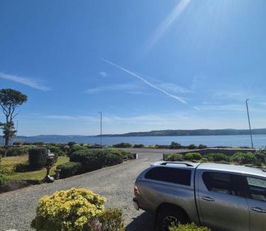 Kilmun House | Inviting Firthview House: Oceanfront & Pet-Friendly Retreat