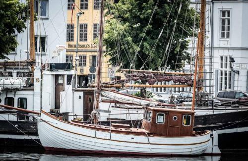 Luebeck Old Town Hotel | Experience Fisher's Loft Hotel: Top-Rated & Pet Friendly