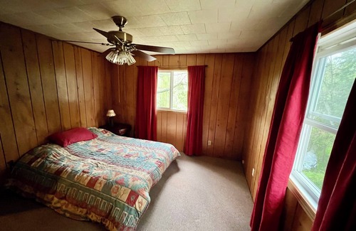 Baldwin Cottage | Discover Fishermen's Riverside Oasis: Pet-Friendly Retreat