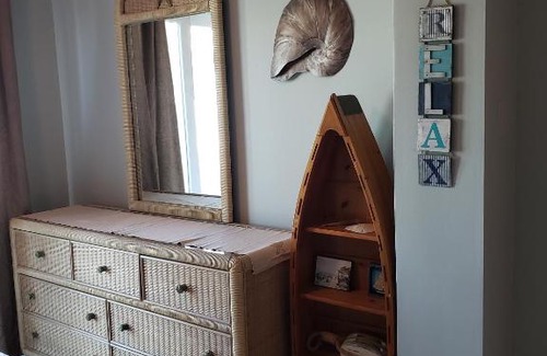 Bay Esplanade House | Five Palms Suite 102: Poolside Comfort for Every Stay