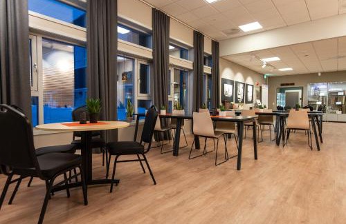 Hattfjelldal Hotel | Discover Fjellfolkets Hus: Family-Friendly & Pet Accessible